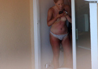 Hotel voyeur,  topless,  tanlined tits pic
