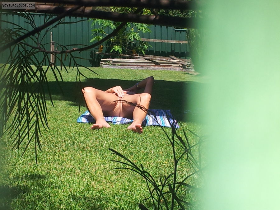 nude woman,  back yard, spread legs