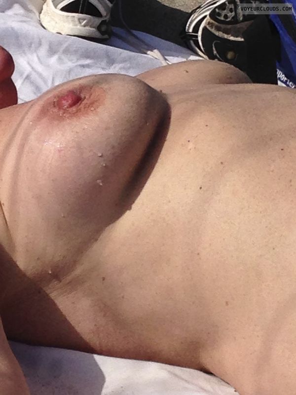 pink areola, hard nipple, public beach, medium tits