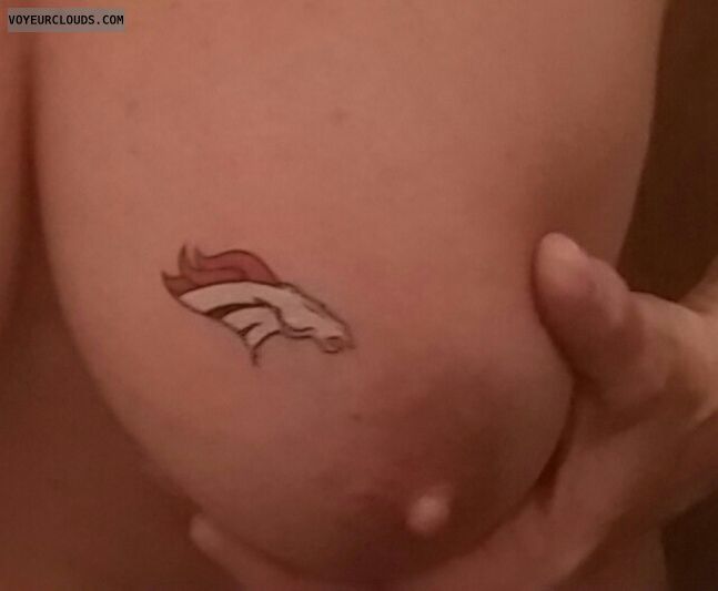 Milf boob, Broncos tattoo, Holding boob