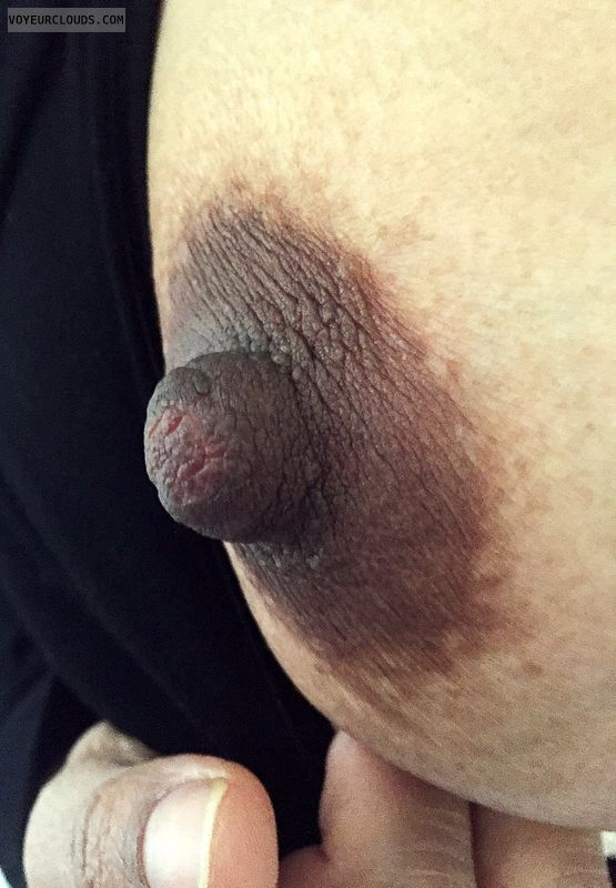 hard nipple, dark nipple, dark areola, tit close up