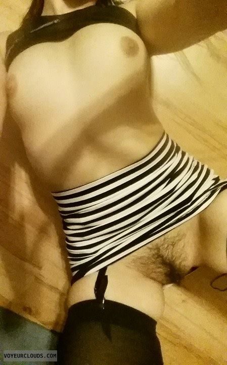 skirt, garterbelt, small boobs, nipples, laying down