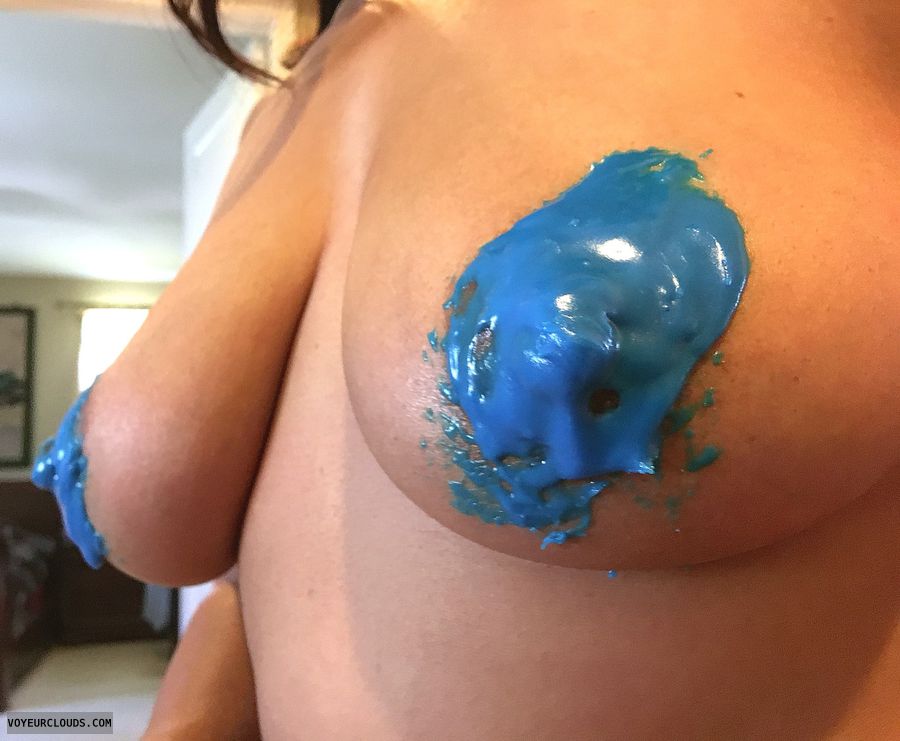 My nipples covered in blue frosting! Yumm