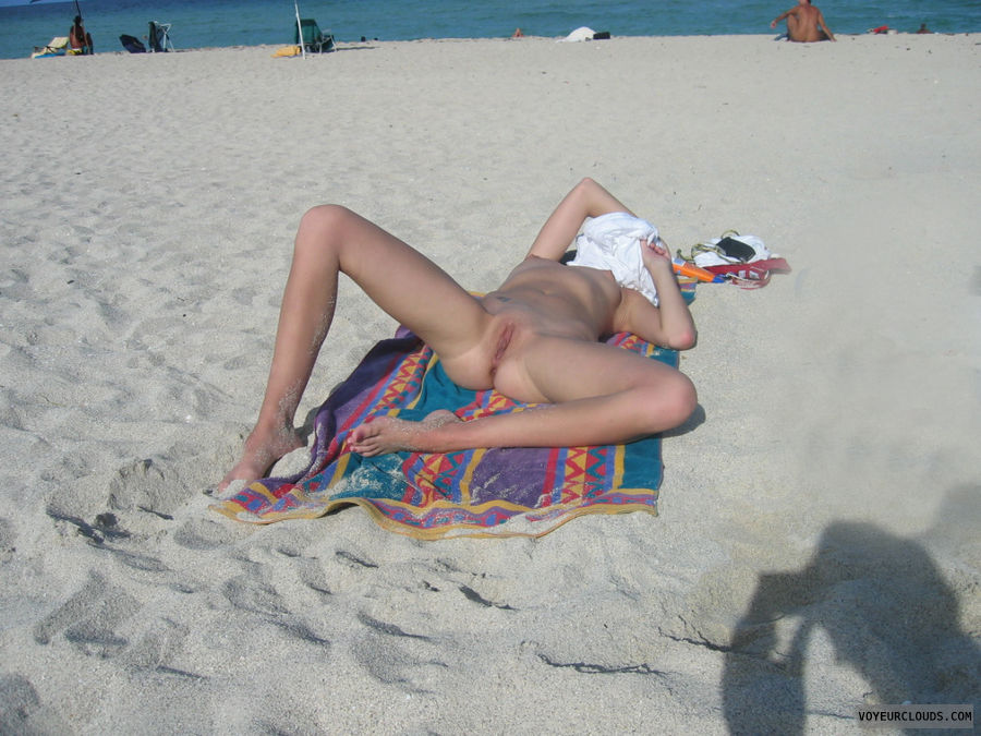 nude beach, shaved, legs wide open